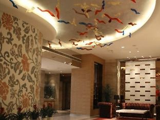 Готель Haishu Taosheng Yiju Business Нінбо Екстер'єр фото